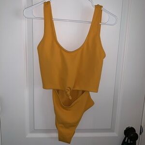 Zaful Women's Yellow Tie Knot Front Ribbed
Cut Out One Piece Swimsuit